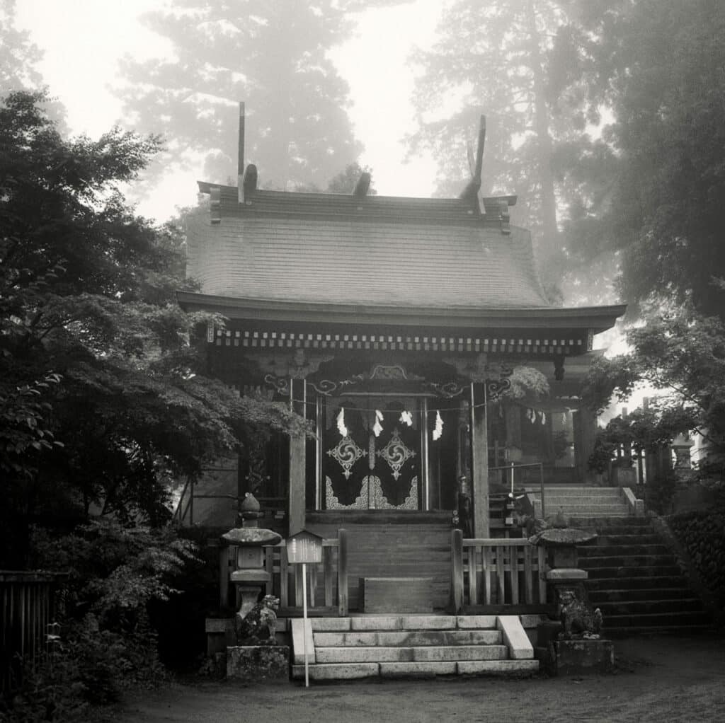 A small shrine in the mist at the summit of Mt Mitake, Tokyo