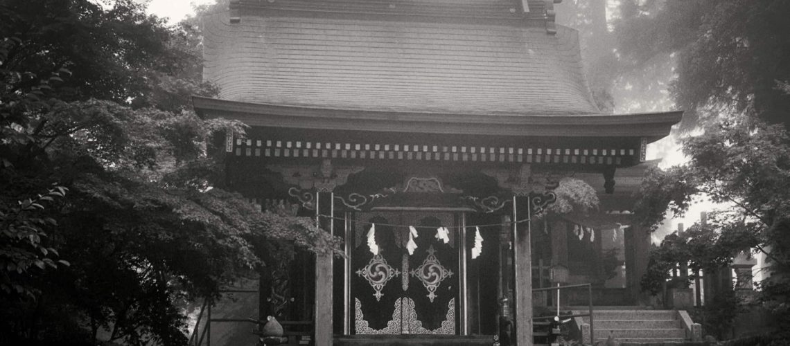 A small shrine in the mist at the summit of Mt Mitake, Tokyo